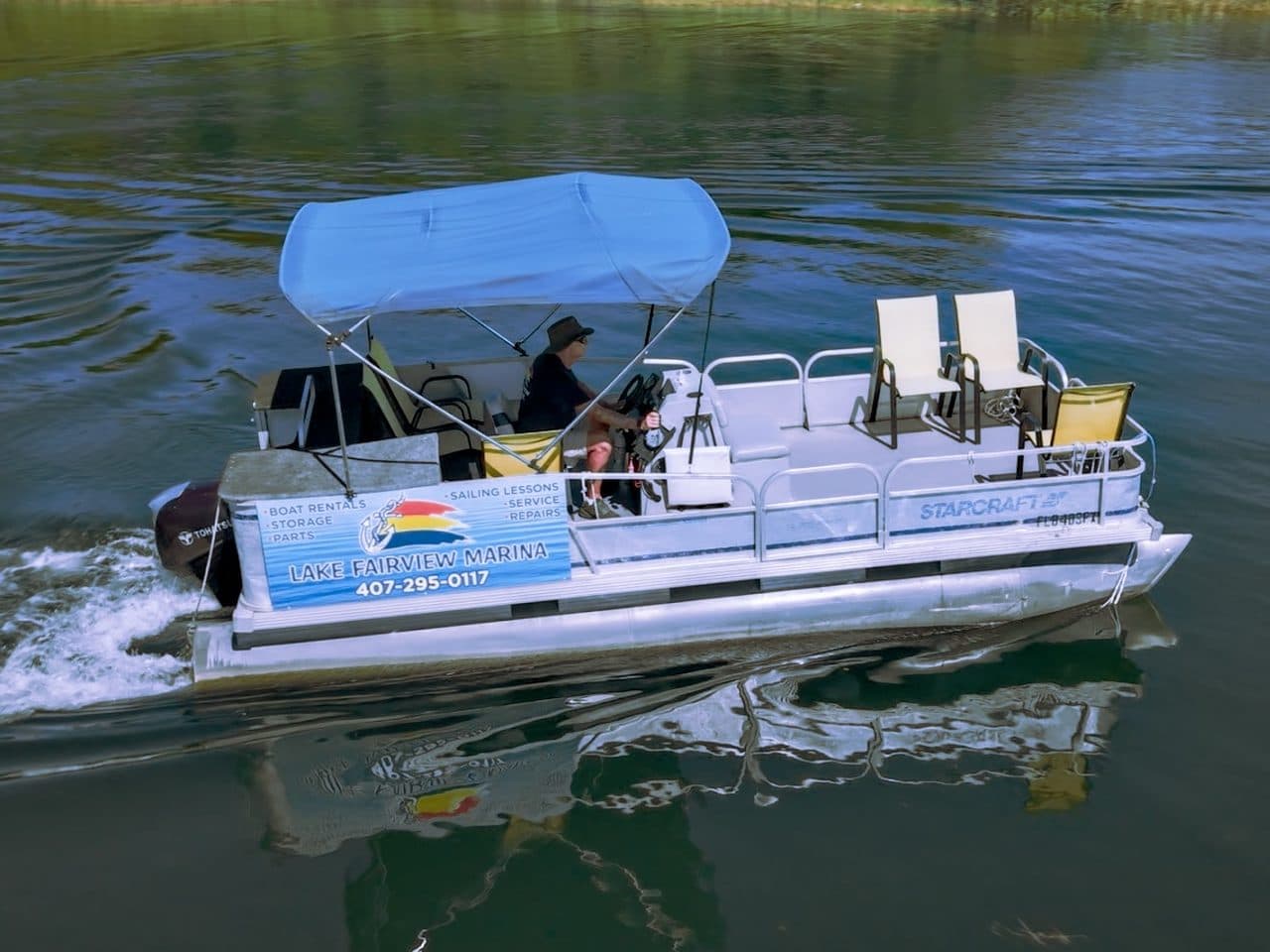 Aerial view of a Lake Fairview pontoon boat on the water